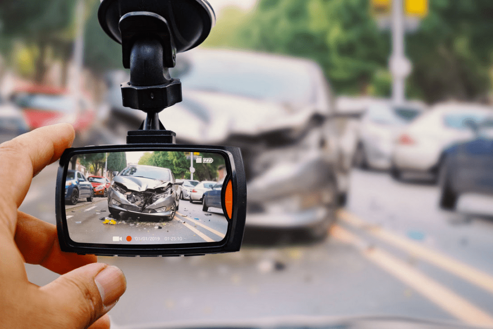 Man is checking his dash cams recorded video